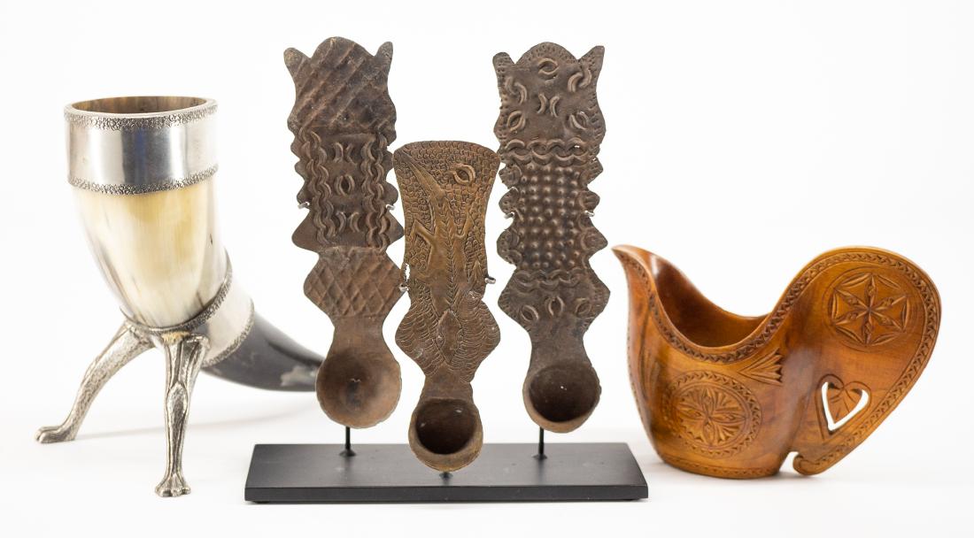 Group of Scandinavian Antiques: A group of Scandinavian antiques including three antique tin spoons on custom stand, a drinking cup and a carved wooden cup. Carved wooden cup is in excellent condition and measures 4.25" x 5.5" x 2.2