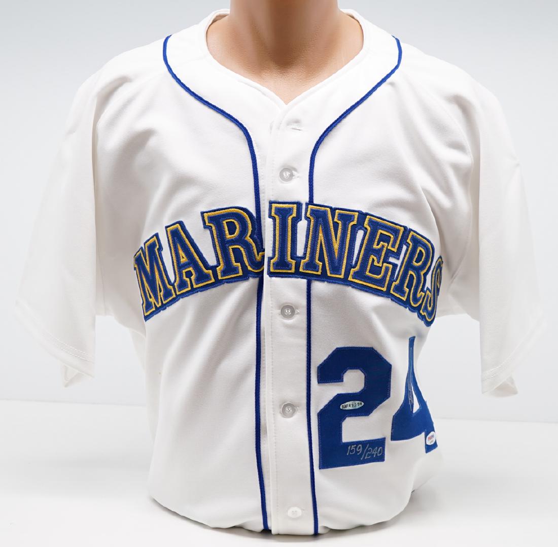 Ken Griffey, Jr. Signed Mariners Jersey PSA/DNA: Ken Griffey, Jr. signed Seattle Mariners replica jersey. Mitchell & Ness size large from the Cooperstown Collection. Includes PSA/DNA COA #AE99502 and Upper Deck Authenticated #BAF49058. NM-MT/MT. We 