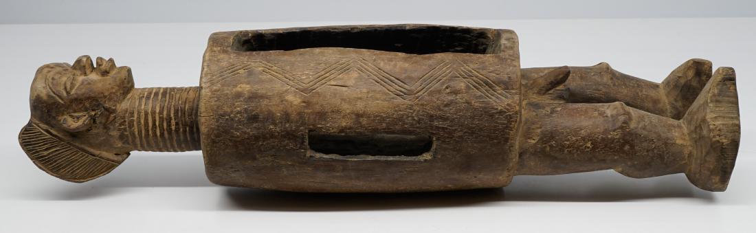 Yaka Tribe Slit Drum: Yaka Tribe slit drum. Measures 24 in. x 5.5 in. x 5.5 in. Private Collection, Spokane, Wa. We ship all items from this auction in-house and gladly combine shipping if possible of multiple items.