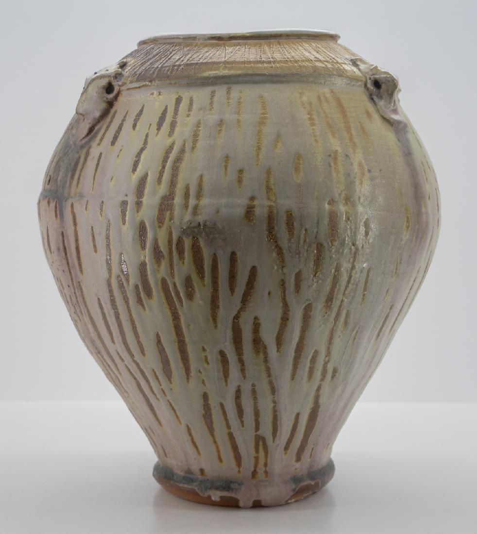 Josh Deweese Large Studio Pottery Vase: Josh Deweese large studio pottery vase. Measures 18" x 14". There is one applied piece that has a chip. This item requires outside shipping.