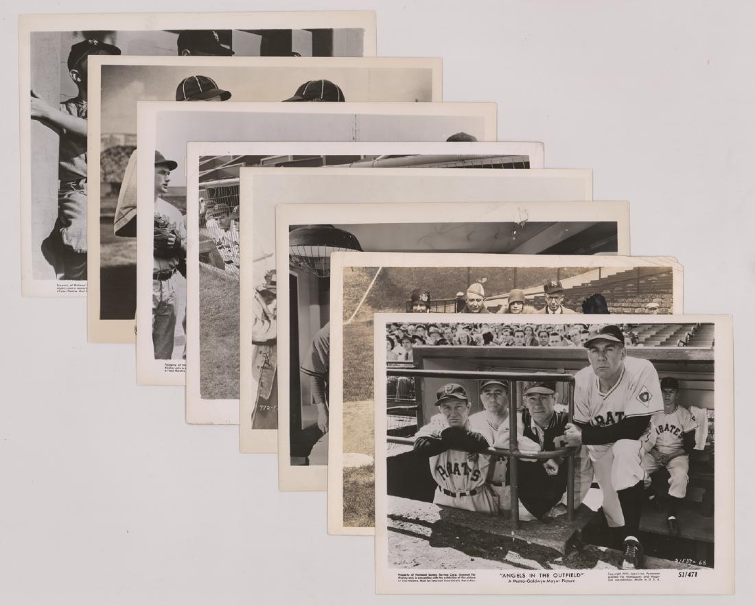 Eight Baseball Movie Publicity Photos: A group of eight vintage baseball movie publicity photos including Angels in the Outfield (1951), The Winning Team, The Jackie Robinson Story and more. They measure 8.125 in. x 10 in. Provenance: Mark