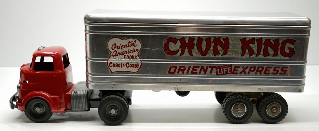 Wyandotte Chun King Tractor and Trailer: Wyandotte Chun King tractor and trailer with both original and restored parts. Measures 24.5 in. x 8.75 in. x 5.75 in. Some parts are expertly restored so please review the photos and draw tour own co