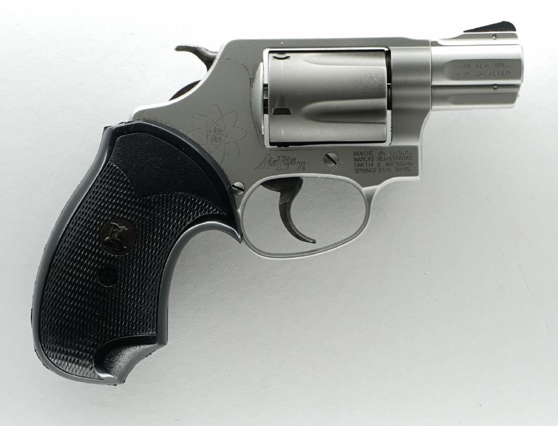 Smith and Wesson AirLite .38 Caliber Ti 337: Smith and Wesson AirLite .38 Caliber Ti 337 Revolver. .38 Caliber S and W Special - P Jacketed. titanium with custom black synthetic checkered grips. Serial Number 401. Excellent condition. If lot is