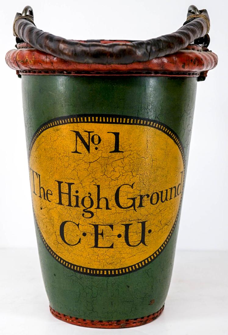 No. 1 The High Ground C.E.U. Leather Fire Bucket: No. 1 The High Ground Leather Fire Bucket. Measures 13.5 in. x 9 in. Good to very good condition, marked 'SL 1998' on base. If lot is absent of a condition report a condition report may be requested v