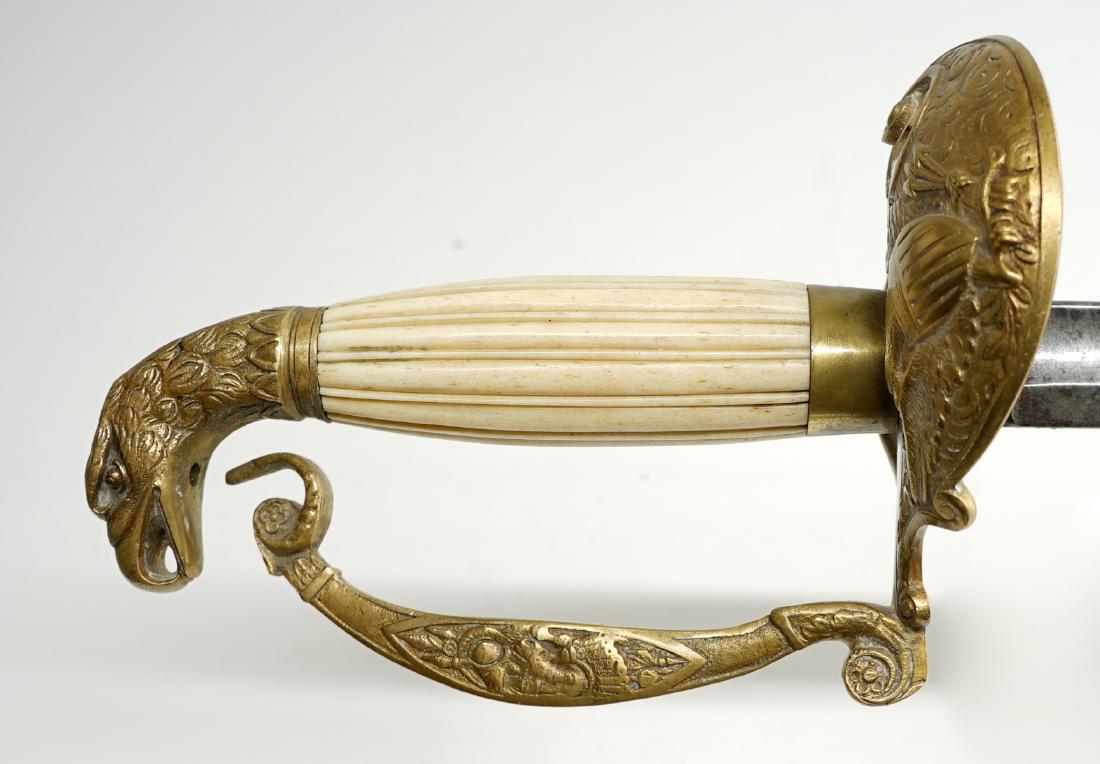 Model 1821 U.S. Artillery Sword: Model 1821 U.S. Artillery Officer Sword, with the eagle head pommel and bone handle. This sword belonged to Major James Jelly, Sr., (died 1840) Steubenville, Ohio. Brass handle and scabbard. Measures 