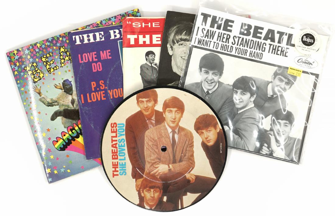 The Beatles 45's with Picture Sleeves and Record: A group of six of The Beatles 45's with picture sleeves and one picture record. Condition of sleeves and vinyl varies. Condition report is provided as an opinion only and is no guarantee as grading ca