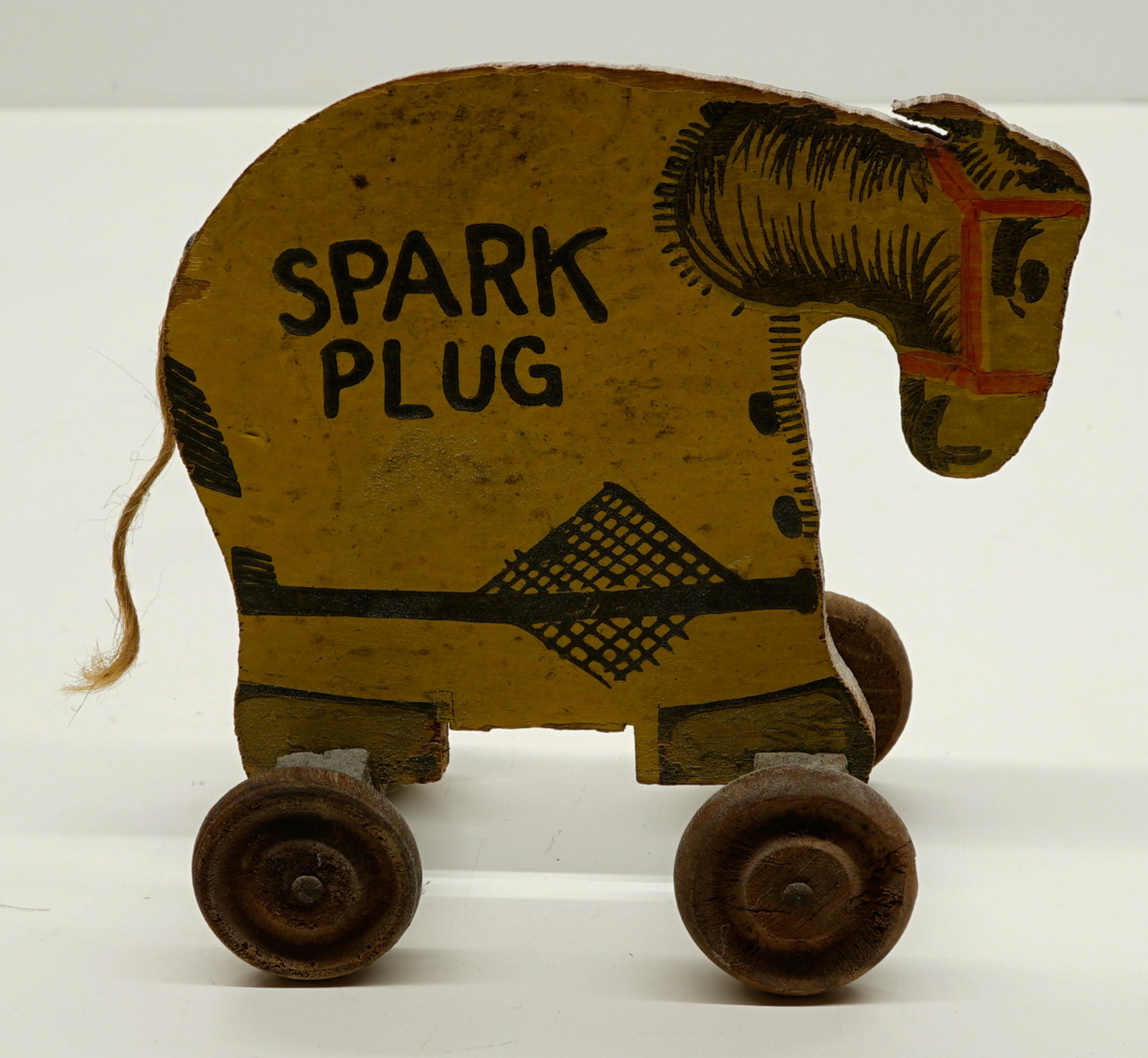Antique Wood Barney Google Spark Plug Pull Toy: Antique Wood Barney Google Spark Plug Pull Toy measuring 5" long 4 1/2" tall. Very good used condition showing minor use and wear. If lot is absent of a condition report a condition report may be requ