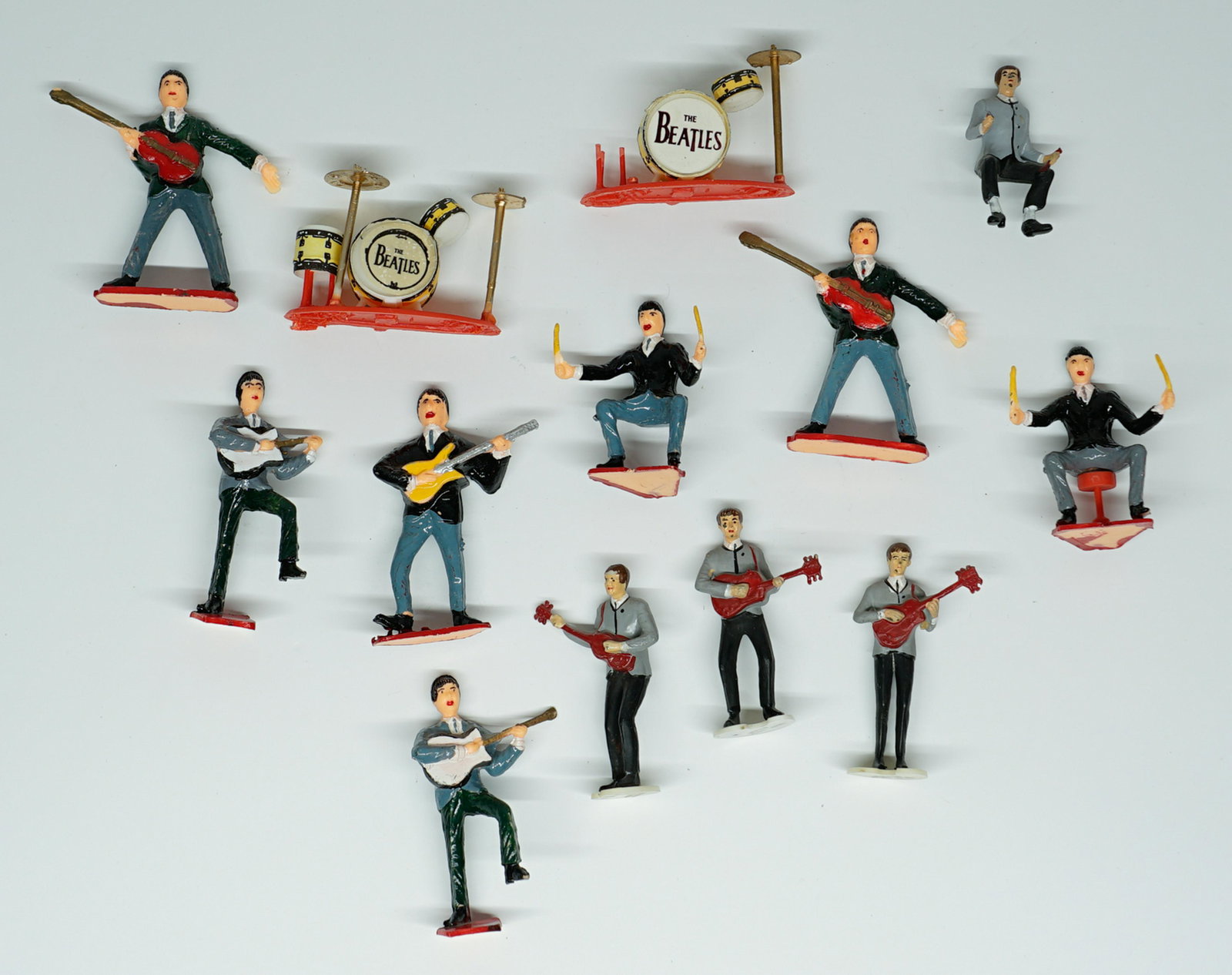 The Beatles Vintage Cake Toppers: The Beatles vintage cake toppers. They measure approximately 3.25 in. tall. Provenance: Private Collection Missoula, Montana. If lot is absent of a condition report a condition report may be requested