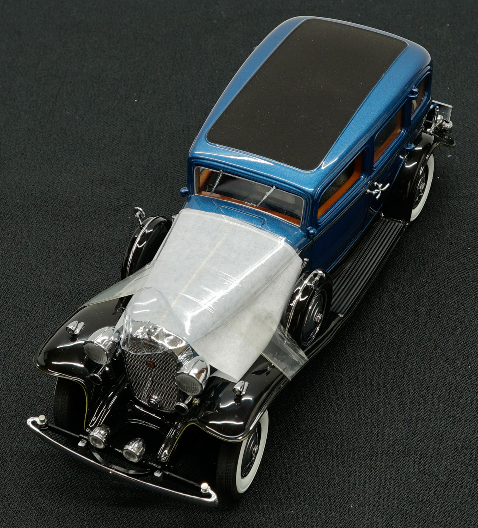 1932 Cadillac V-16 Fleetwood Sedan Limited Edition: 1932 Cadillac V-16 Fleetwood Sedan Limited Edition 1:24 scale model car. Mint in box, no papers. The Danbury Mint. Provenance: Private Collection Missoula, Montana. If lot is absent of a condition rep