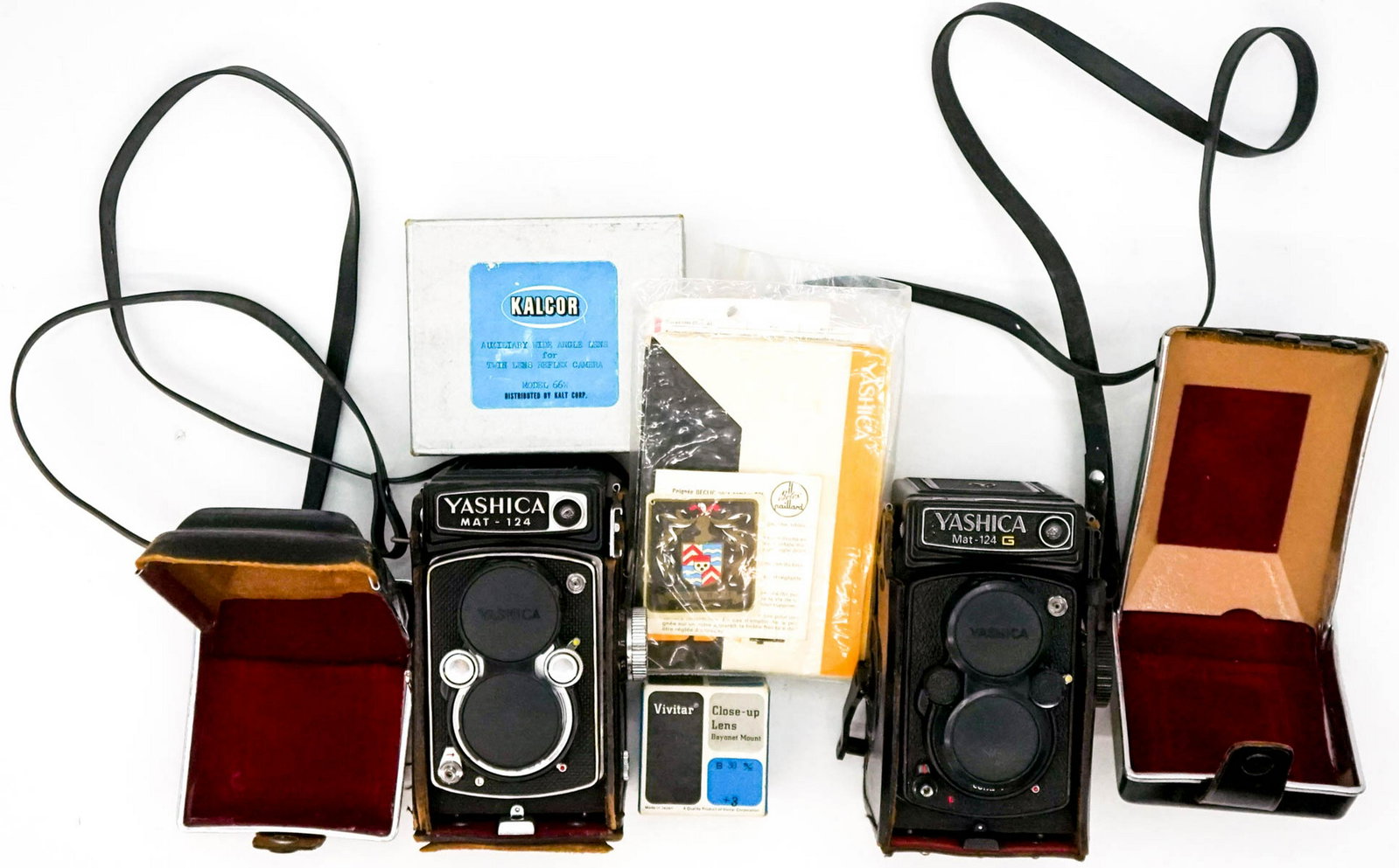 Yashica Twin Lens Reflex Cameras (2): Two Yashica twins lens reflex cameras with extra Kalcor lens and other accessories. If lot is absent of a condition report a condition report may be requested via email. Condition report is provided a