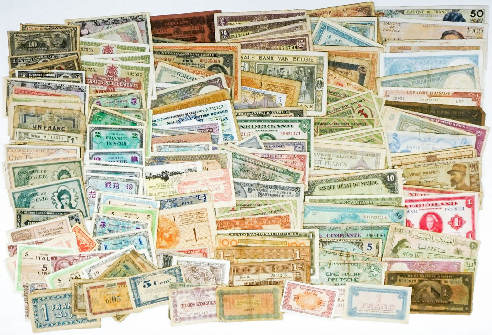 Group of Old Foreign Currency (216): A group 216 pieces of old foreign currency. Includes Cuba, Straights Settlement, France and many, many more. Condition varies. Provenance: Amity Art Foundation, Inc. If lot is absent of a condition re