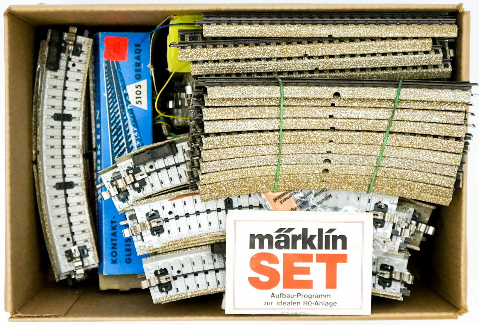 Group of Marklin Track: Group of Marklin track and accessory. If lot is absent of a condition report a condition report may be requested via email. Condition report is provided as an opinion only and is no guarantee as gradi