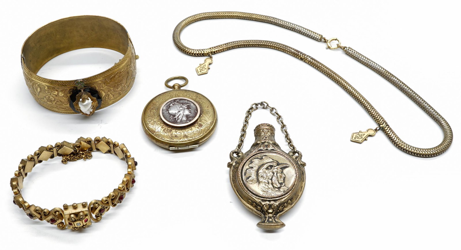 Victorian Jewelry and Accessories: A group of Victorian and/or Victorian-style jewelry and accessories. Includes bracelets, locket and more. If lot is absent of a condition report a condition report may be requested via email. Conditio