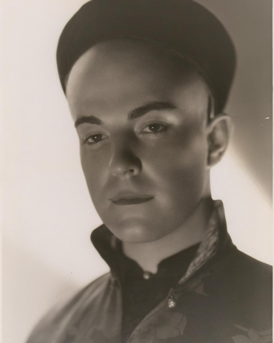 Ramon Novarro Photographed by Clarence Bull: Ramon Novarro in 'The Son-Daughter' (MGM, 1932) oversized production movie still. Photographed by Clarence Sinclair Bull with photographers rubber stamp verso and blind stamp lower right. Semi-Glossy