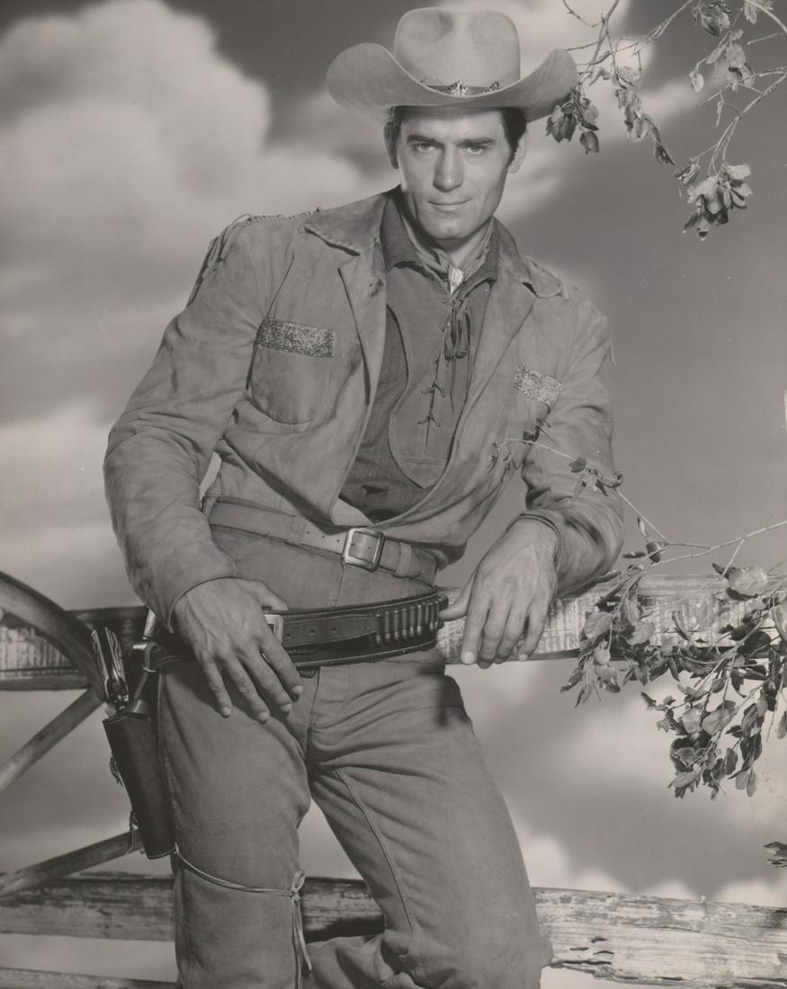Clint Walker Vintage Oversized Publicity Photo: Clint Walker vintage oversized photograph. Matt surface, double-weight black and white gelatin silver print. Measures approximately 14 in. x 11 in. Excellent condition. Provenance: Formerly the person