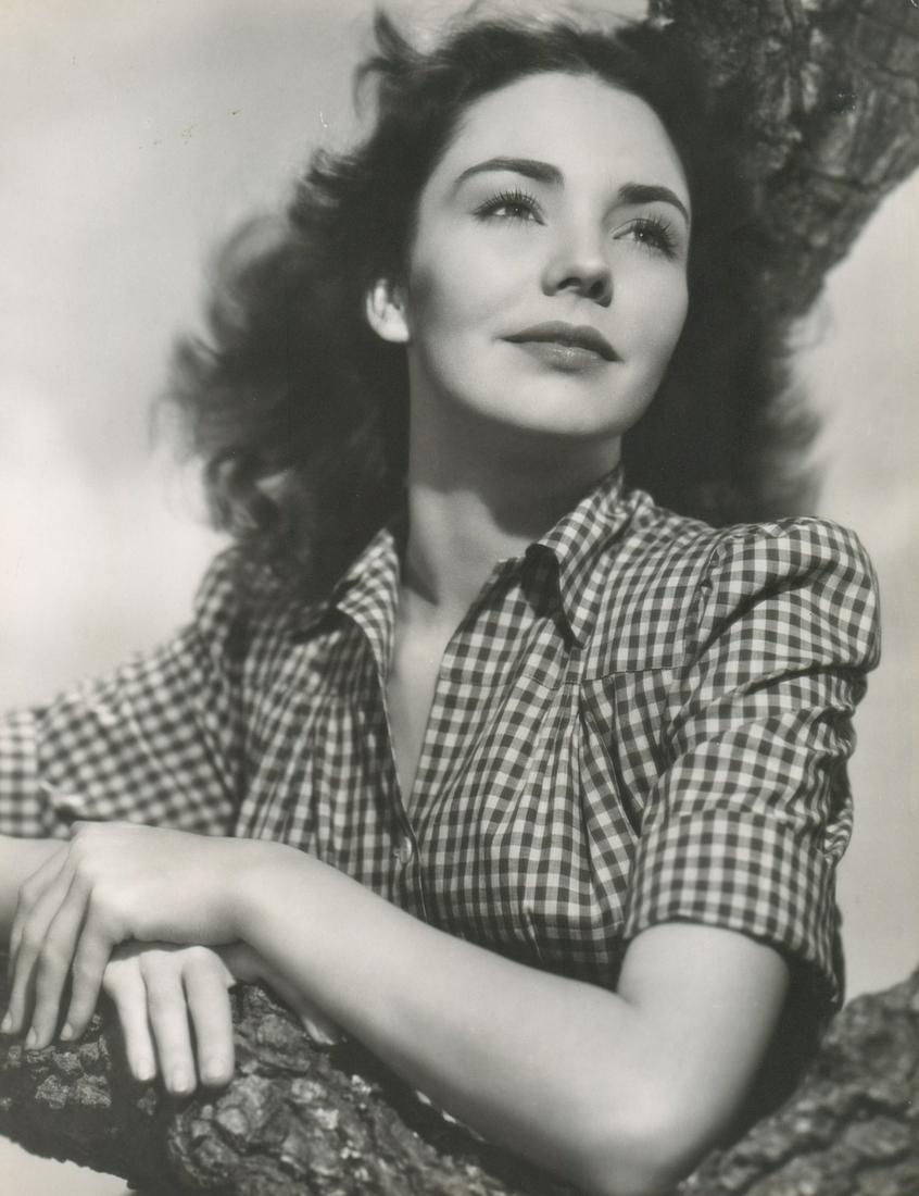 Jennifer Jones Photographed by 'Whitey' Schafer: Jennifer Jones in Love Letters (Paramount, 1945) oversized publicity photograph. Photographed by A L 'Whitey' Schafer with photographers rubber stamp verso. Matt surface, double-weight black and white