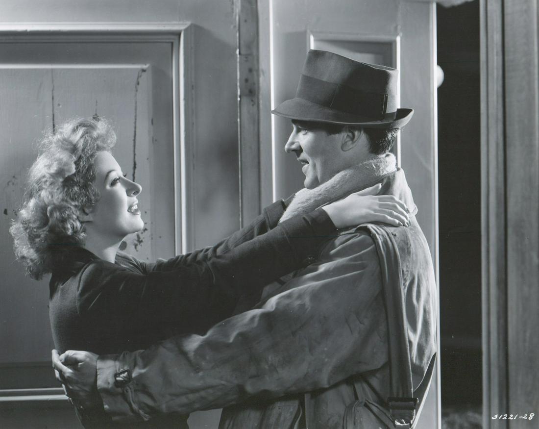 Greer Garson by Clarence Sinclair Bull: Greer Garson production still photo dated 1942 and photographed by Clarence Livingston Bull. Semi-glossy surface double-weight black and white photo. Measures approximately 8 in. x 10 in. Excellent co