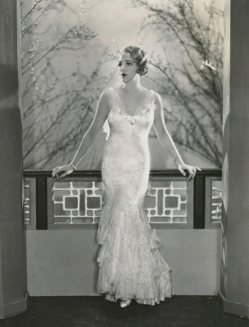 Bebe Daniels in 'Maltese Falcon' by Elmer Fryer: Bebe Daniels in 'The Maltese Falcon' (Warner Brothers, 1941) pre-release production or publicity still photograph by Elmer Fryer. Photographer Elmer Fryer rubber stamp on verso. Glossy surface black a