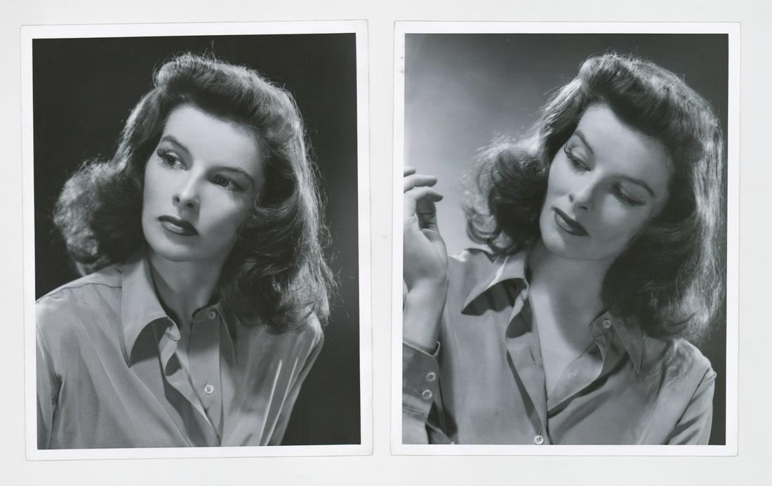 Katharine Hepburn Photographed by Clarence Bull: Two Katharine Hepburn publicity stills photographed by Clarence Sinclair Bull. From 'The Philadelphia Story', they are dated 1940 on verso in rubber stamps. Both are semi-glossy surface, double-weight