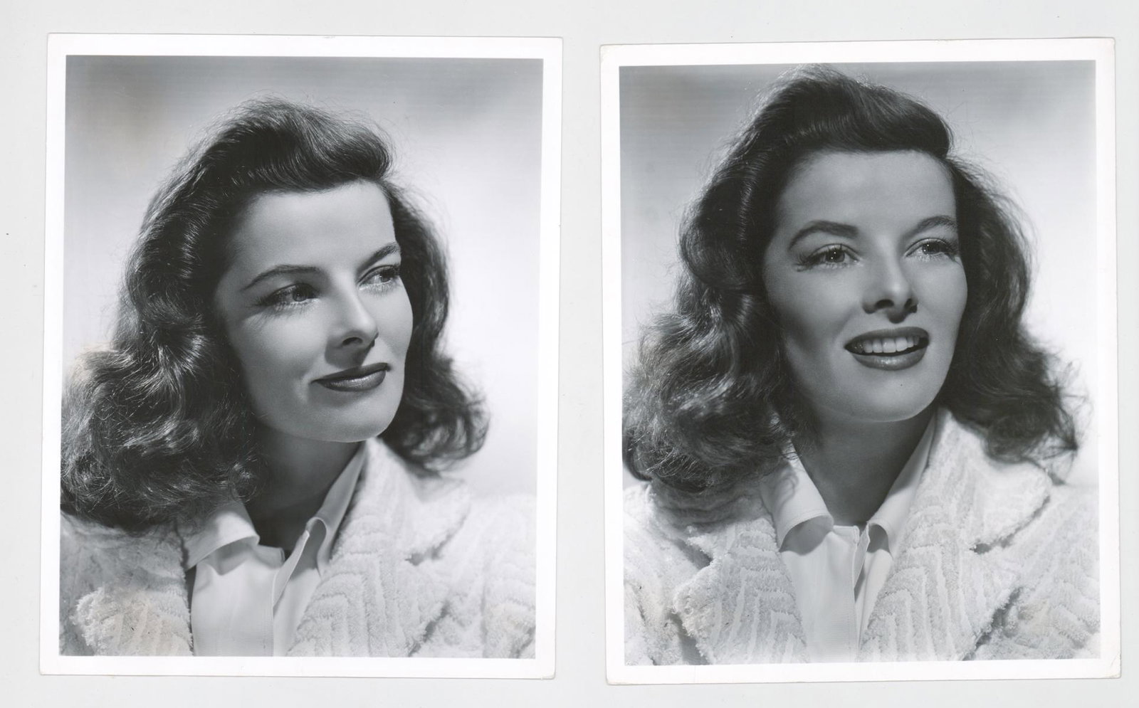 Katharine Hepburn Photographed by Clarence Bull: Two Katharine Hepburn publicity stills photographed by Clarence Sinclair Bull. From 'The Philadelphia Story', they are dated 1940 on verso in rubber stamps. Both are semi-glossy surface, double-weight