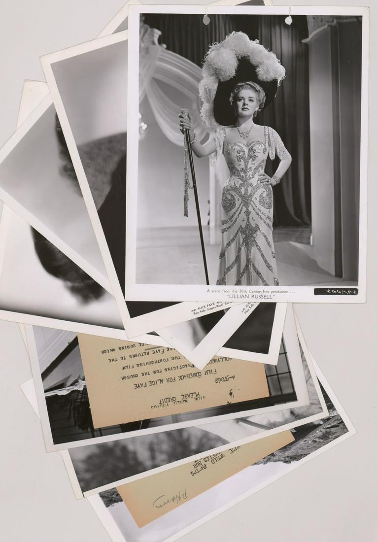 Alice Faye Vintage Publicity and Wire Photos (7): Alice Faye vintage publicity and wire photos (7). Glossy, single-weight black and white photographs. They measure approximately 7 in. x 9 in. to 8.125 in. x 10 in. VG-EX/EX condition. Provenance: Form