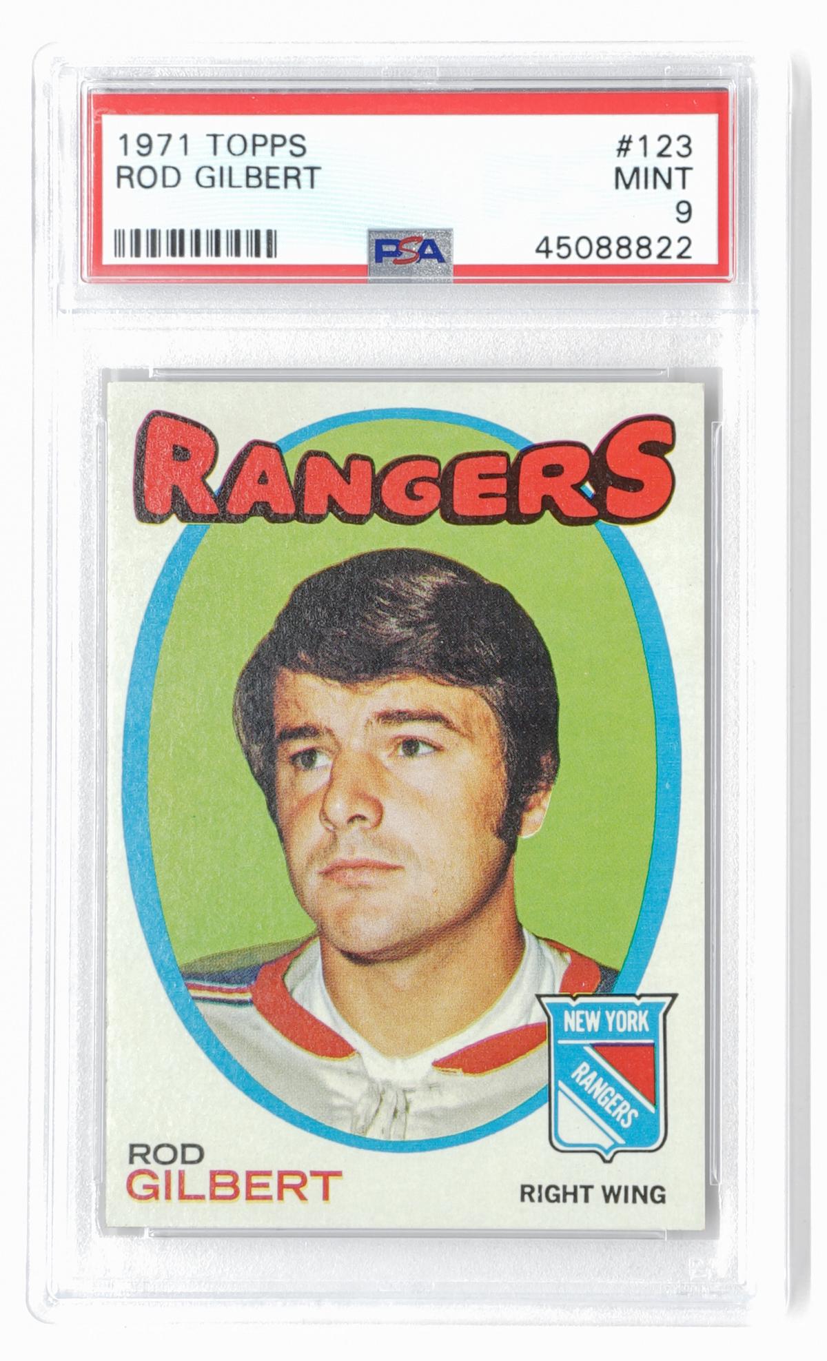 1971 Topps Hockey Rod Gilbert #123 PSA 9 Set Break: 1971 Topps Hockey Rod Gilbert #123 PSA 9 Mint from Set Break. Condition report is provided as a courtesy and is only an opinion. This condition report is in no way a guarantee or binding assignment of
