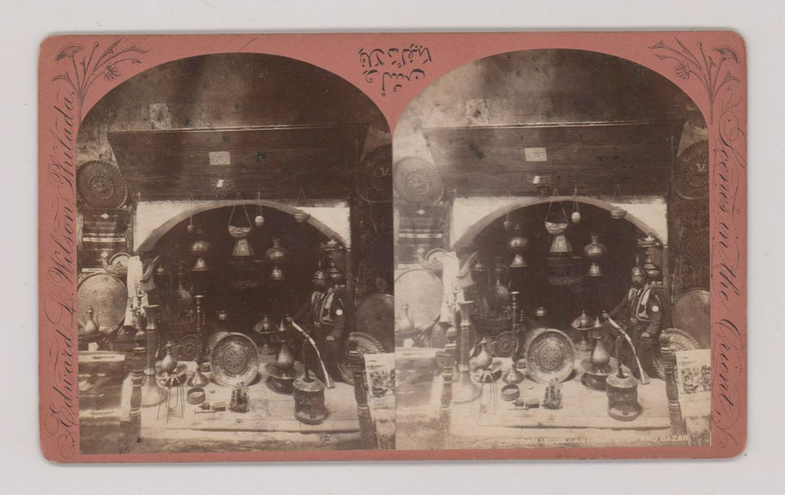 Edward Wilson Oversized Stereoview Damascus: Edward Wilson oversized stereoview 'Damascus Antique Shop and Bazar'. Slightly curved mount, excellent condition.4.25 in. x 7 in. Provenance: the Mark Rucker Collection. If lot is absent of a conditio