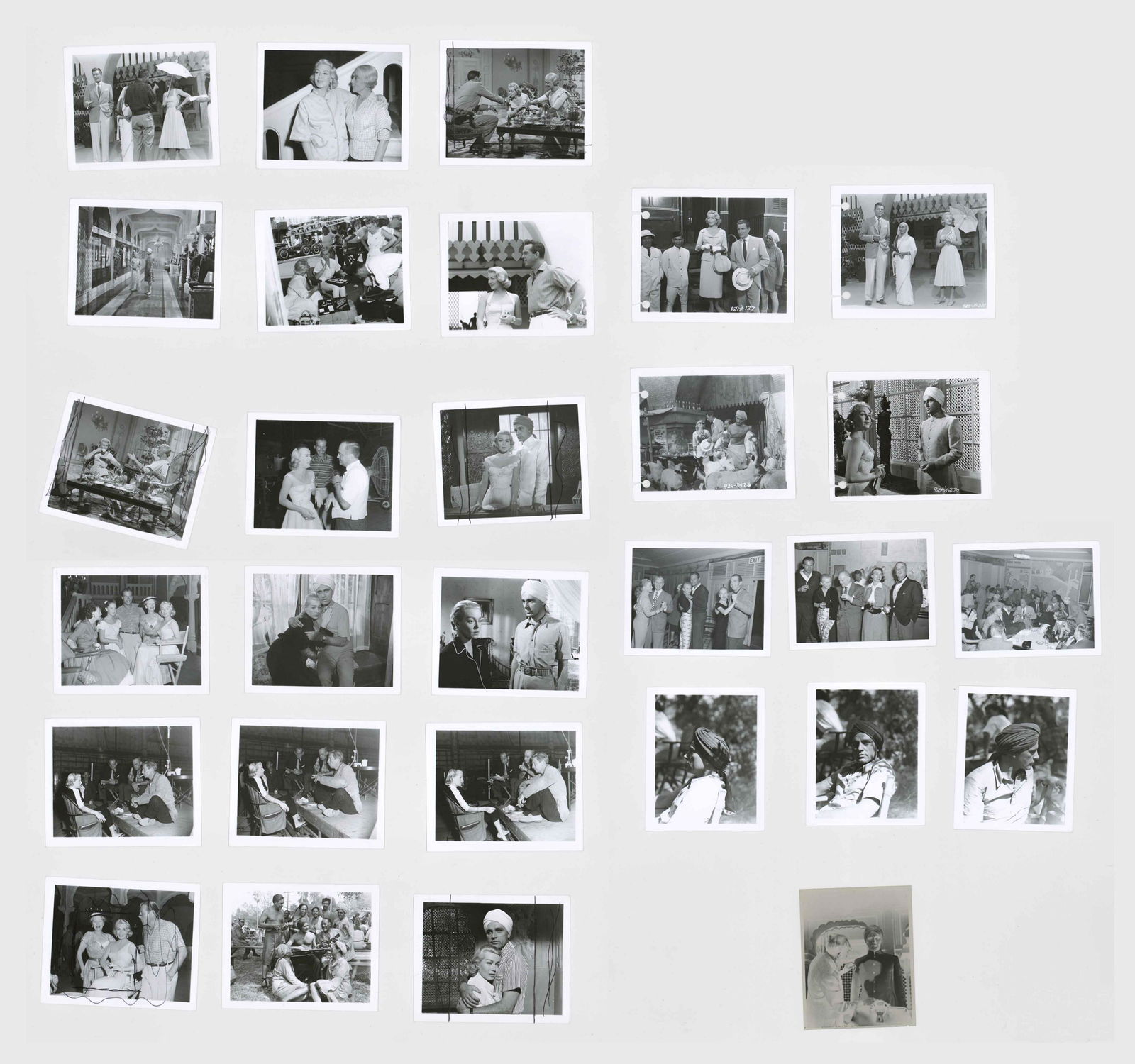 The Rains of Ranchipur Production Photos (28): The Rains of Ranchipur (20th Century Fox, 1955) original, vintage production and candid photos (28). Also includes one original negative of Richard Burton that does not have the photo. They measure 4