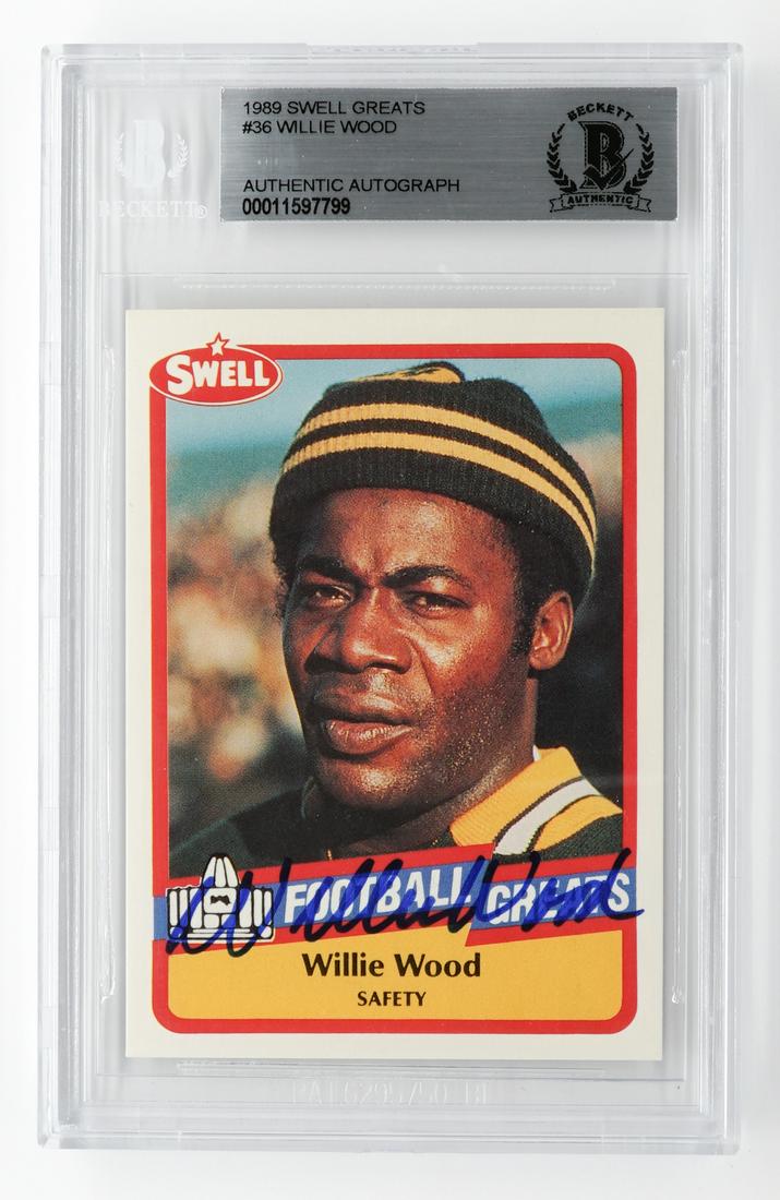 Willie Wood Autographed Football Card: Willie Wood autographed football card. Authenticated and encapsulated by Beckett Authentication Services. If lot is absent of a condition report a condition report may be requested via email. Conditio