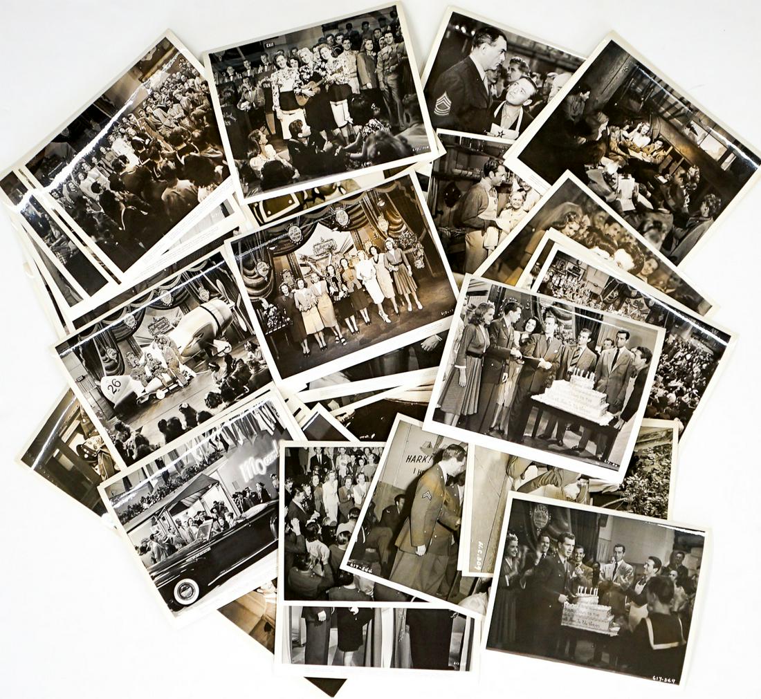 Bette Davis 'Hollywood Canteen' Photos (50): Group of over fifty Hollywood Canteen publicity photos. Bette Davis, Jane Wyman, Jack Gerson, John Garfield, Eleanor Parker, Bob Hutton and others. Black and white single-weight glossy. Measure approx