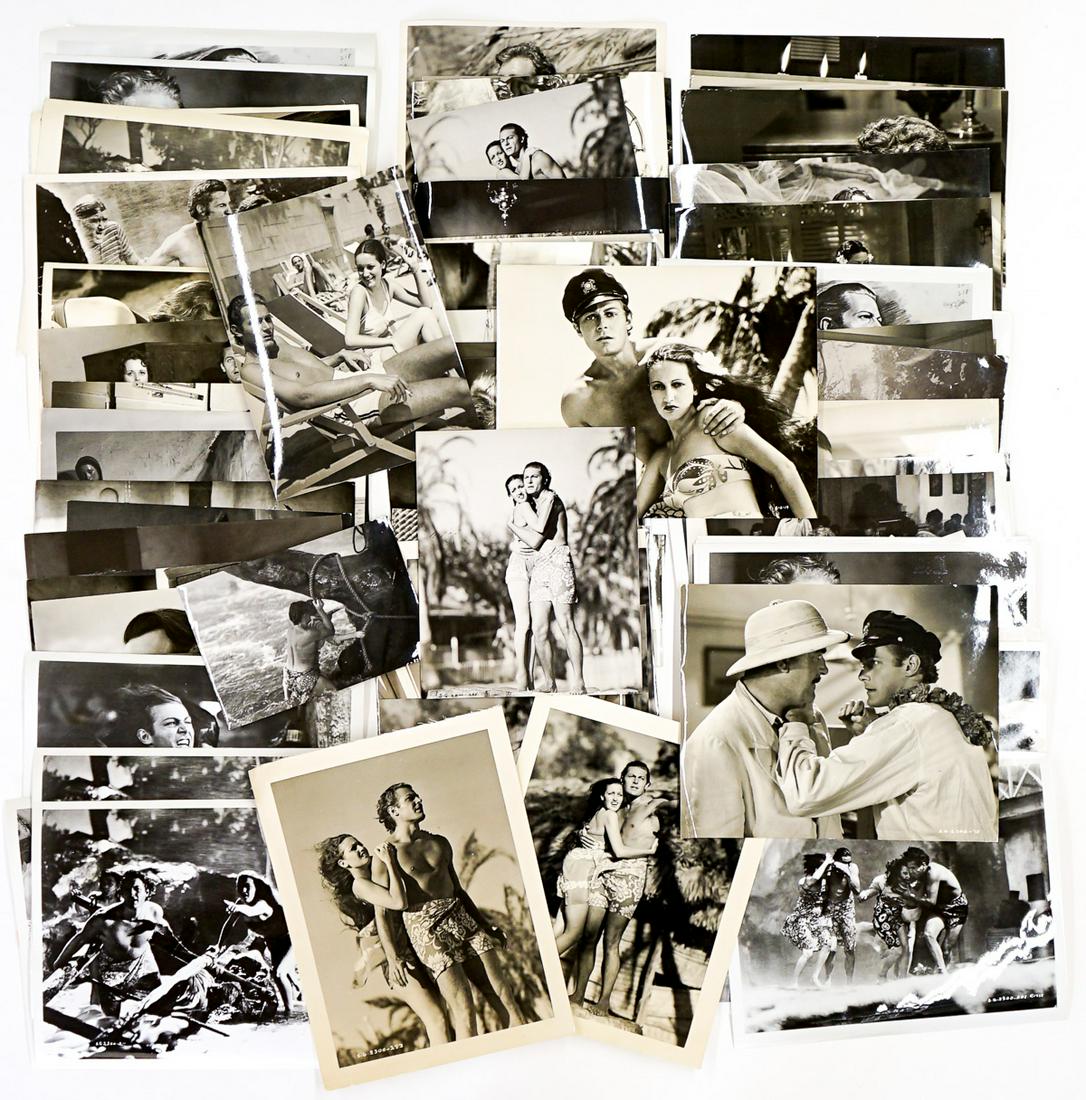 Dorothy Lamour 'The Hurricane' Photos 80: Dorothy Lamour and John Hall "The Hurricane' (Samuel Goldwyn, 1937) over eighty publicity photos. Black and white single-weight glossy (six with linen backing). Measure approximately 4.5 in. - 8 in. x