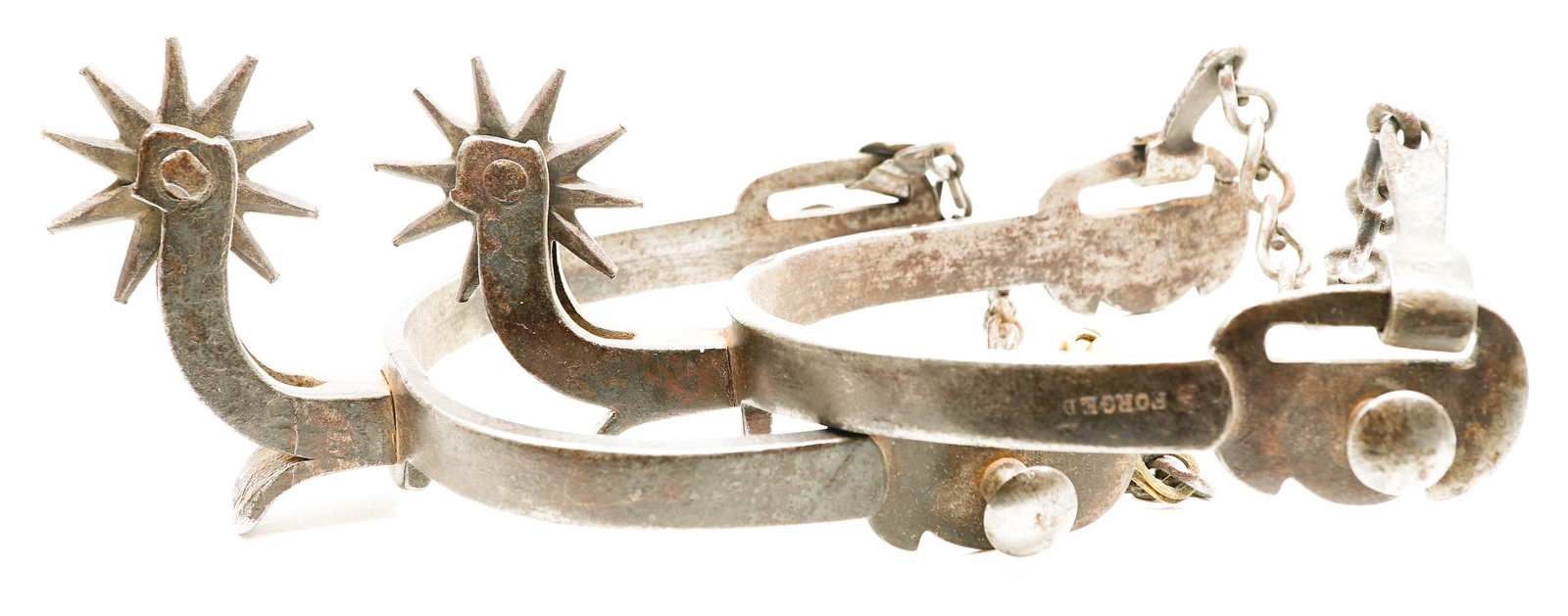 A Pair of Antique Spurs: A pair of antique spurs. They measure 5.25 inches x 4 inches. If lot is absent of a condition report a condition report may be requested via email. Condition report is provided as an opinion only and 