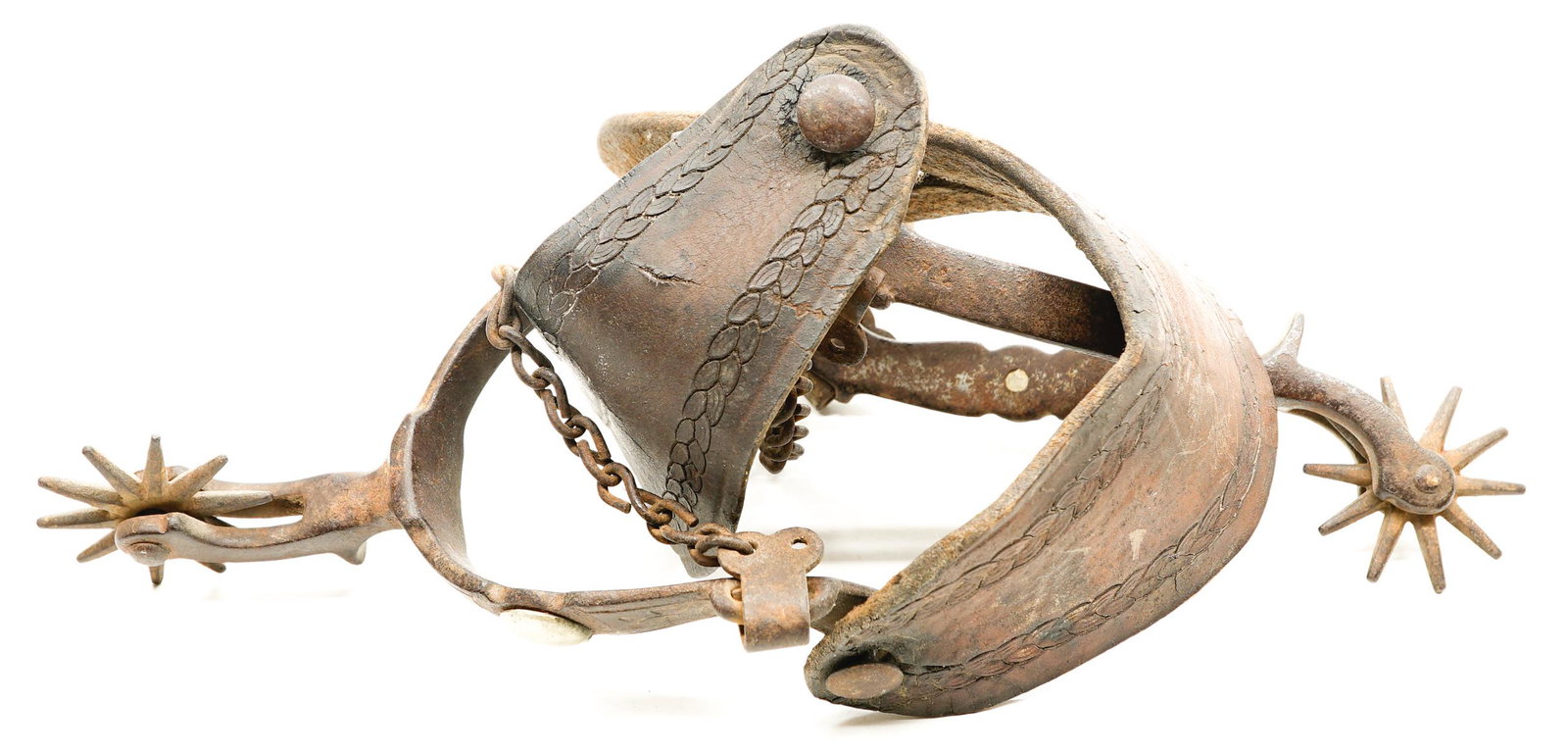 A Pair of Antique Spurs: A pair of antique spurs. They measure 6.25 inches x 4.5 inches not measuring the leather. If lot is absent of a condition report a condition report may be requested via email. Condition report is prov