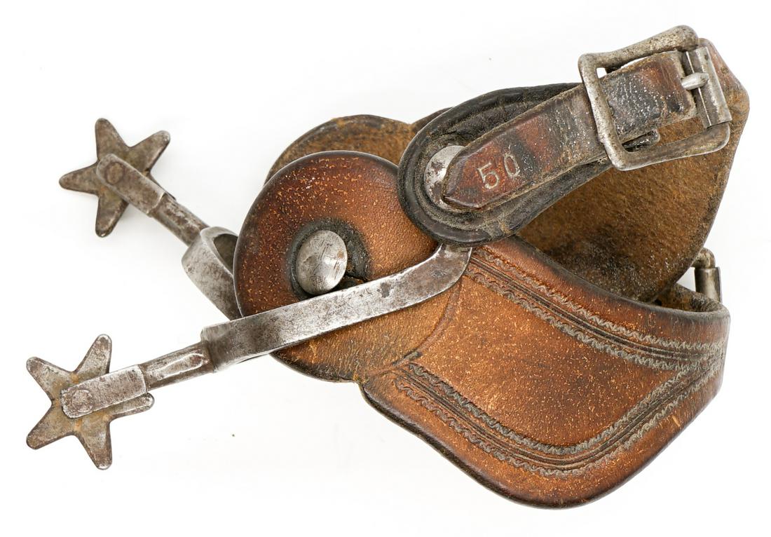 A Pair of Antique Spurs: A pair of antique spurs. They measure 4.75 in inches x 3.125 inches (not measuring the leather). If lot is absent of a condition report a condition report may be requested via email. Condition report 