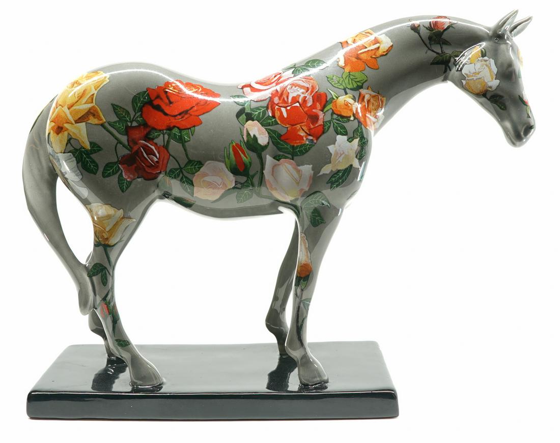 Rosie The Apparoosa Porcelain Horse Figure: Rosie The Apparoosa porcelain horse figure from The Trail of Painted Ponies. Measures 5.875 in. x 7.75 in. x 2.25. No damage or repairs. If lot is absent of a condition report a condition report may b