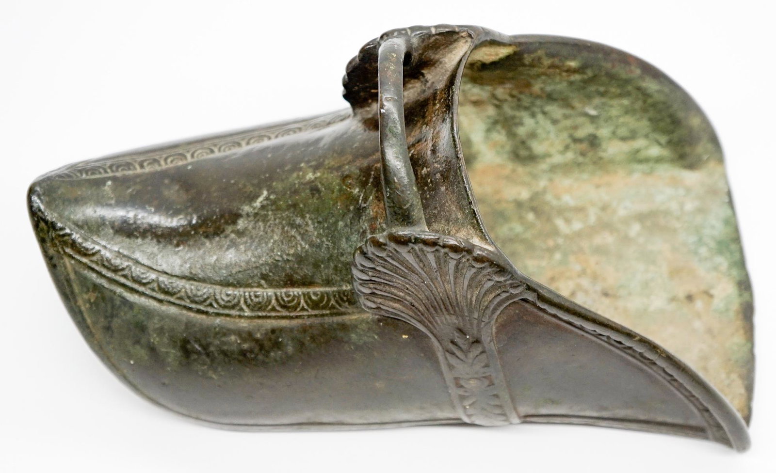 Spanish Colonial Stirrup - Conquistador: Spanish Colonial Stirrup - Conquistador. Measures 10 in. x 5 in. x 4.75 in. There is a split along the front right of bottom of stirrup If lot is absent of a condition report a condition report may be