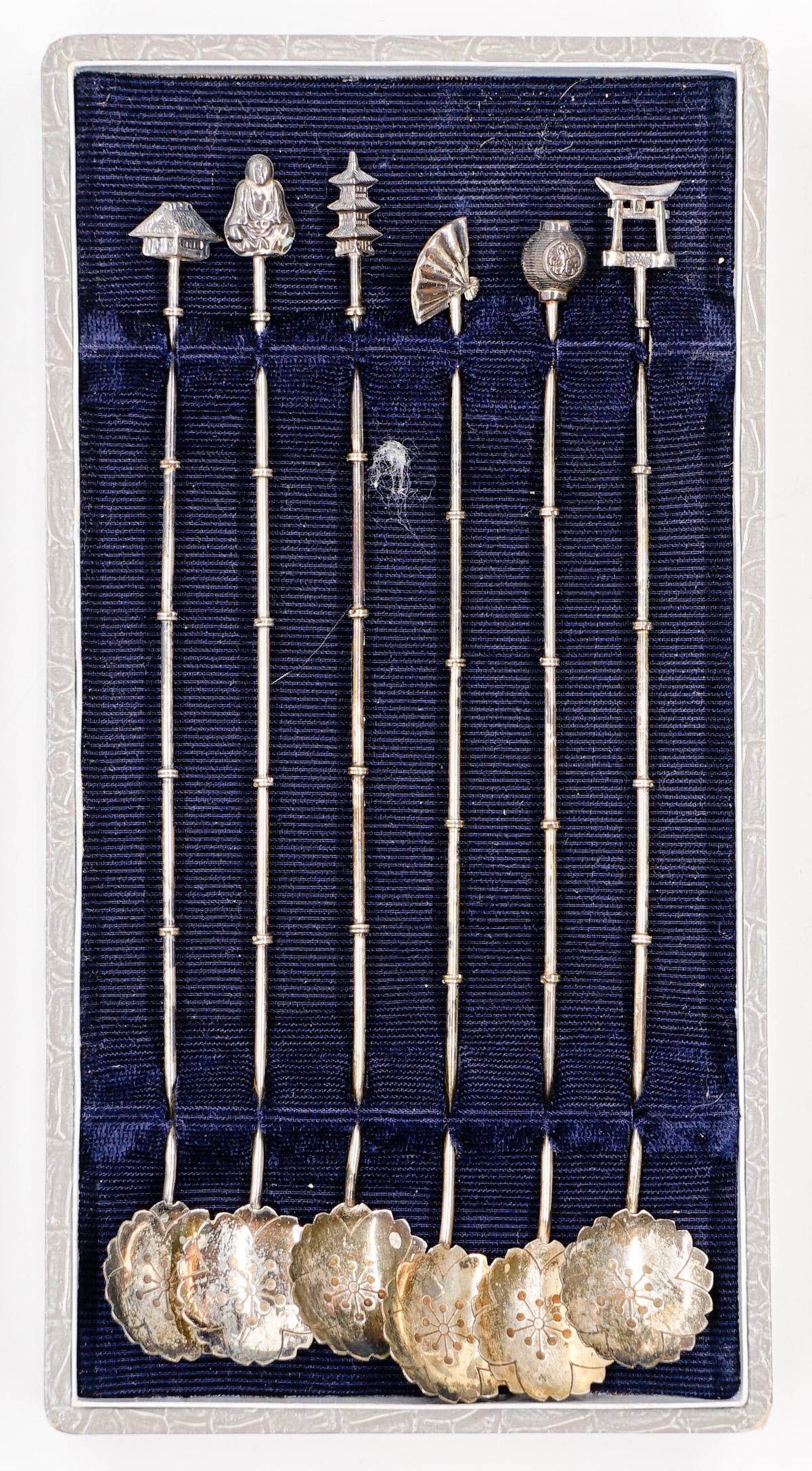 Japanese Sterling Iced Tea Spoons: Set of (6) Japanese sterling iced tea spoons. They are marked 'Sterling' and measure 8 inches in length. If lot is absent of a condition report a condition report may be requested via email. Buyer mus