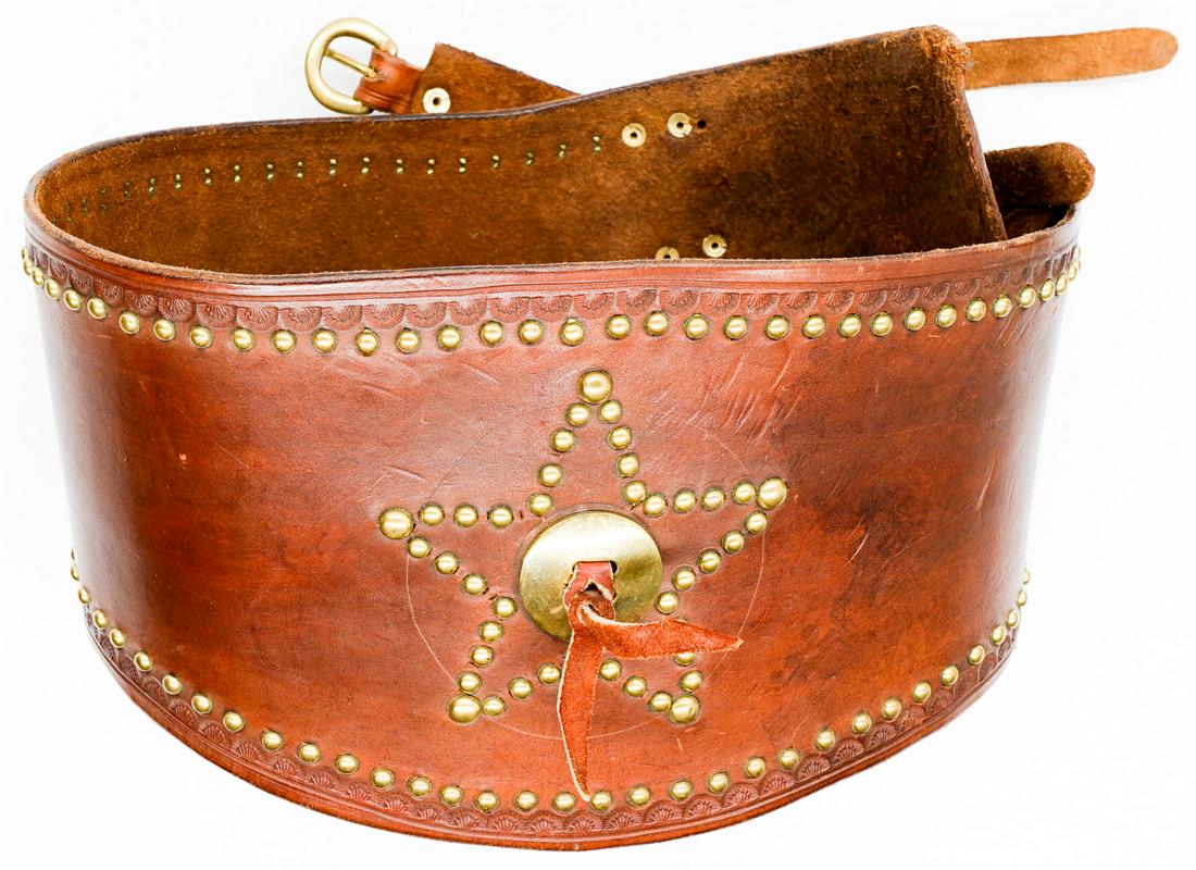 Old West Rodeo Kidney Belt: Old West Rodeo leather kidney belt. Measures 45 in. x 7.5 in. Excellent condition with replaced brass rivets. Buyer must view photographs or scans to assist in determining condition and ask further qu