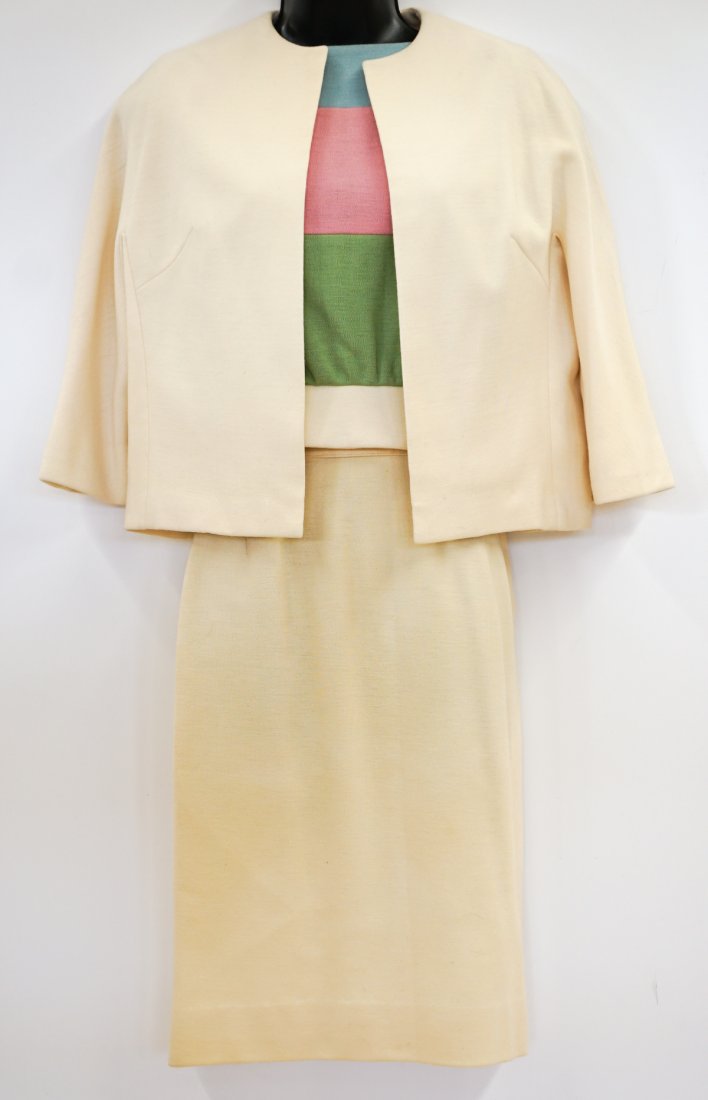 Lilli Ann San Francisco Three Piece Suit Set: Lilli Ann San Francisco Vintage 3 piece Beige knit suit set with lined skirt, jacket with Pink and Green strip Shell. Skirt measures 28 in. waist, 34 in. hip, 23.5 in. length. Skirt with a Gene's Butt