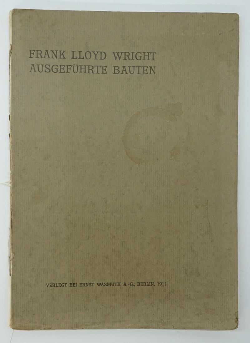 Frank Lloyd Wright Ausgefuhrte Bauten 1911: SCARCE Frank Lloyd Wright Ausgefuhrte Bauten. 1911, Berlin. Paperwrap. Plans and designs with black and white photo illustrations. Frontispiece is in color. 141 pp. Stingbound. Many pages are loose or