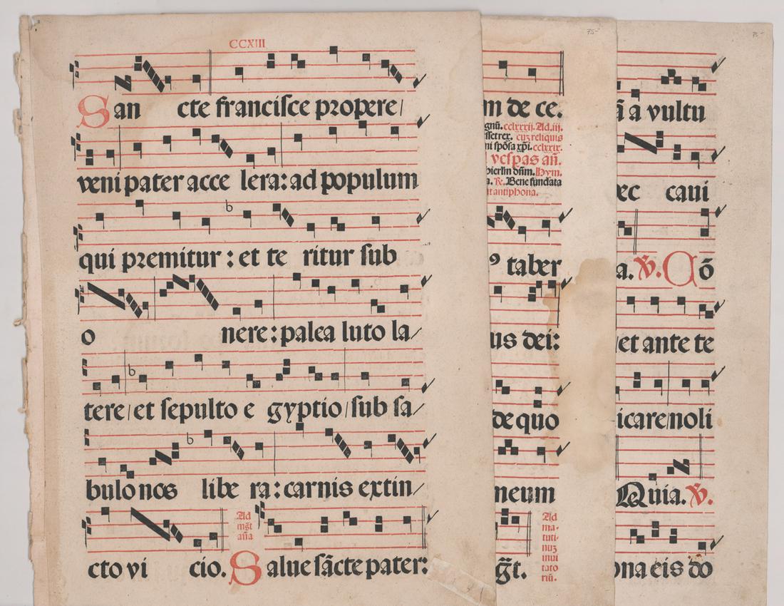 Large and Early Music Pages: Three large and early pages from a music book. Pages measure 20.75 in. x 14.5 in. Provenance: Estate of Russell Johanson, Ravenna Rare Books, Seattle, WA. If lot is absent of a condition report a cond