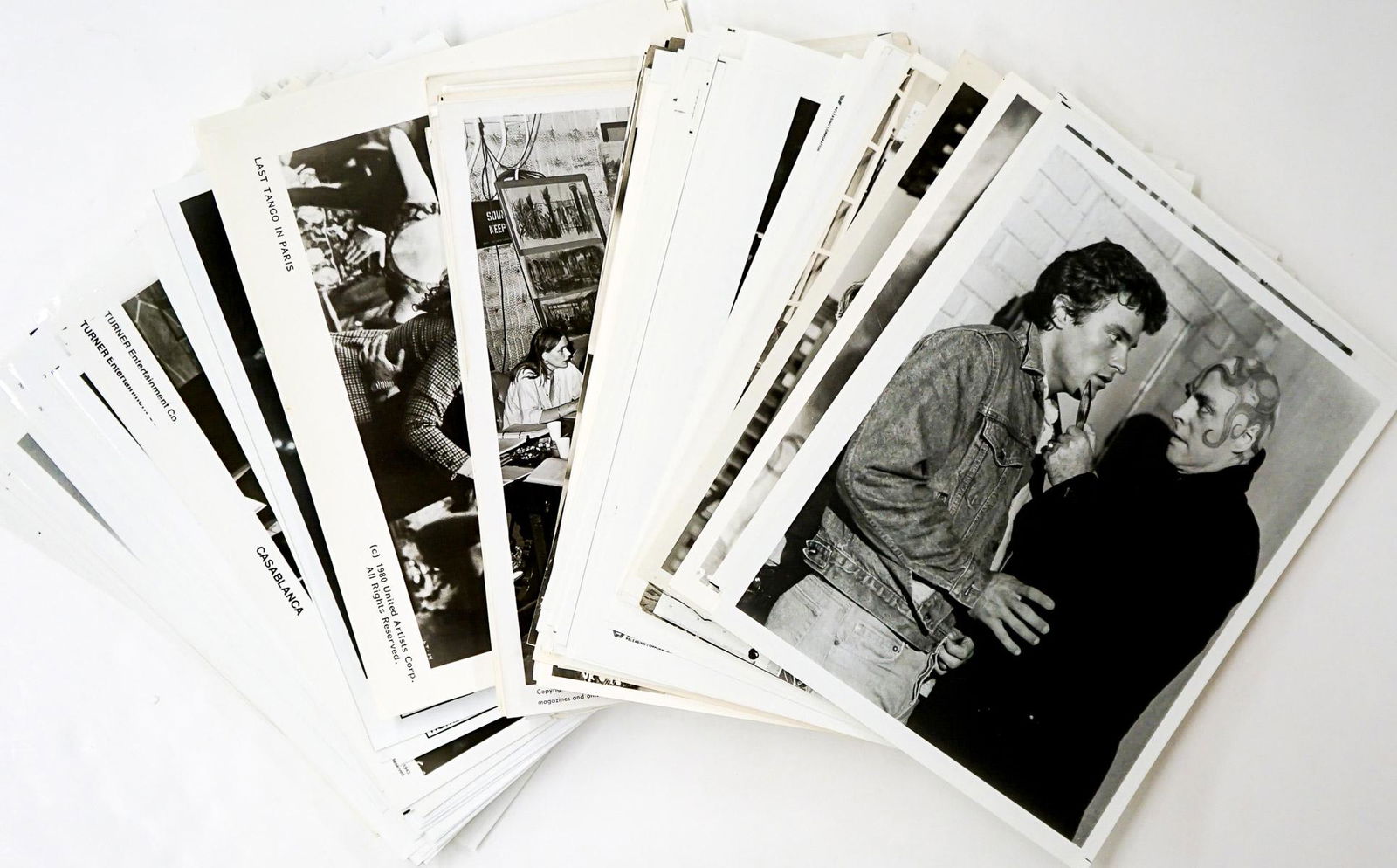 Actor Publicity Photos (200) 60's - 80's: Group of over 200 publicity entertainment photos of films, re-released or renewed and television actors and actresses during the 1960's - 1980's. Includes Carrie Fisher, John Travolta, Audrey Hepburn,