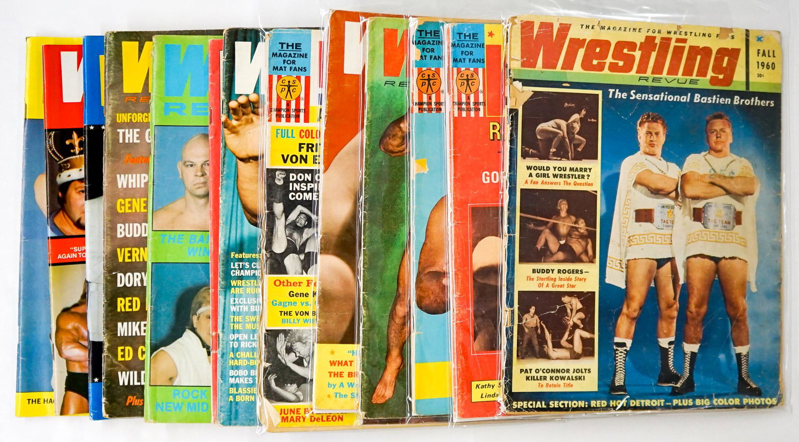 Wrestling Revue Magazines (15): Wrestling Revue - Pro Wrestling Magazines group of (15). Includes years 1960 - 2003. (3) 'As is' with detached Covers. Condition varies. Provenance: Estate of James Baldwin Baker, Cornelius Oregon. If