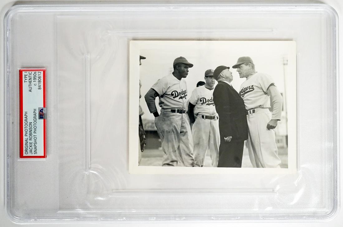 Jackie Robinson Original Type I Photograph: Jackie Robinson original Type I photograph. This snapshot photograph was taken during production of 'The Jackie Robinson Story'. From the estate of Pat Flaherty, Flaherty is seen working with Robinson