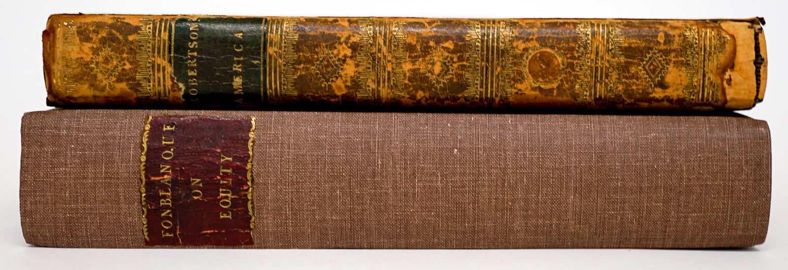 Antique History (2) Books: Two antique history books. Includes: 1) The History of America by William Robertson. 1808, 11th edition. Volume 2 only of a 4 volume set.. 432 pp with 2 fold-out maps. 2) A Treatise of Equity by John