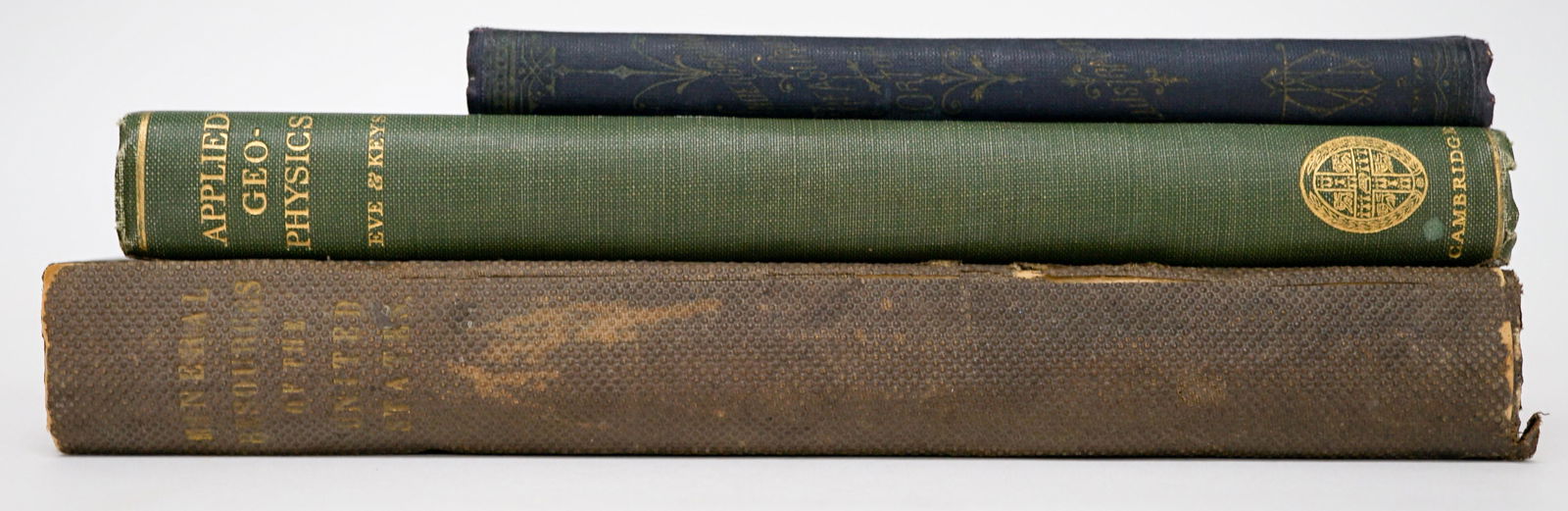 Minerals and Mining (3) Books: Group of three books of minerals and mining. Includes: 1) Underground Treasures by James Orton. 2) Applied Geophysics In the Search for Minerals. 1929. 3) The Mineral Resources of the United States. 1