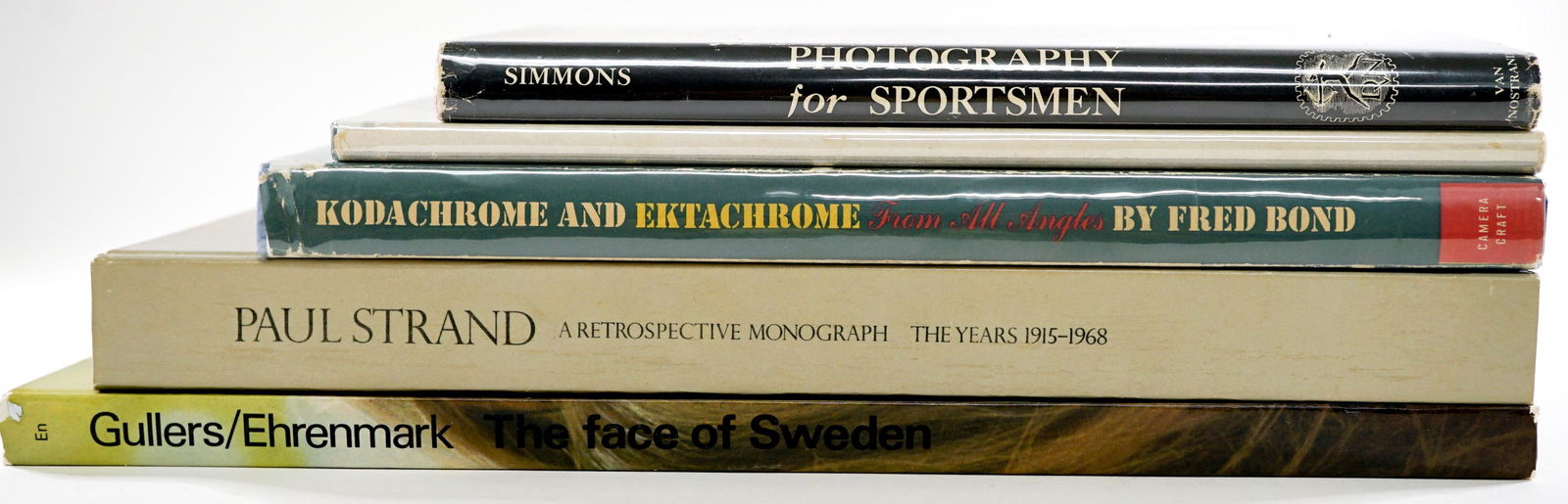 Photo-Books and Photography (5) Books: Group of five photo-books and photography. Includes: 1) Photography for Sportsmen by Albert Dixon Simmons. 1951, stated first edition. 2) Paul Strand Photographs 1915-1945; and 1915-1968. 3) Kodachrom