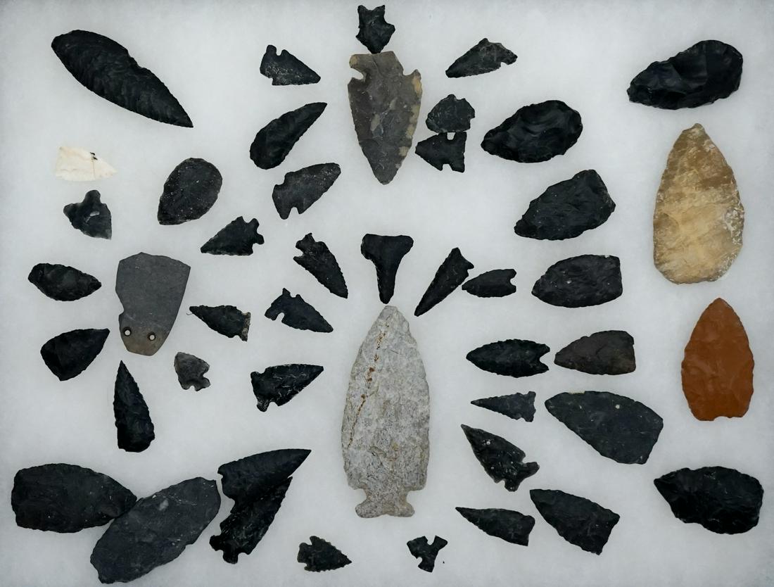 [Idaho] Native American Artifacts (44): Group of (44) Native American artifacts including various points, arrowheads, blades found years ago by Mr. Siepert at Paul Gunderson's ranch, Terryton, Idaho. 31 points, 6 knives, 2 large points and 
