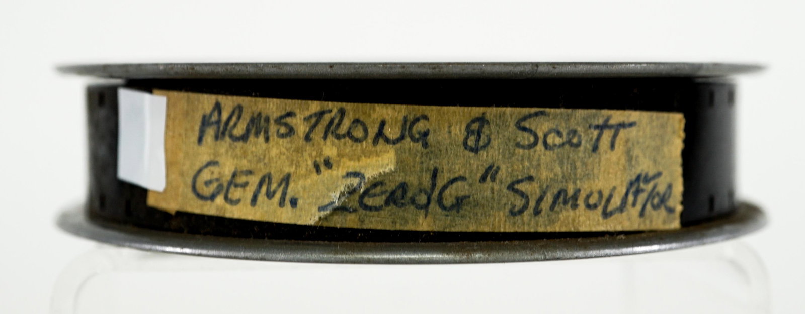 Armstrong and Scott Gemini Zero G Simulator: Armstrong and Scott Zero Gravity simulator 16mm film. Nearly full 3.625-in. plastic reel. Not viewed, appears fine with only the outer layer of film having surface dirt. Distributed for institutional,