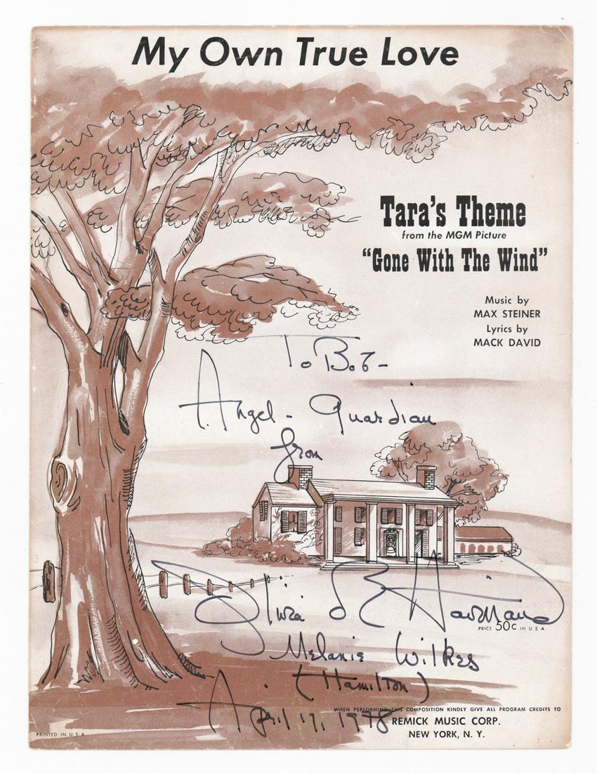 Olivia de Havilland Signed GWTW Sheet Music: Olivia de Havilland signed Gone With The Wind original sheet music, My Own True Love, Tara's Theme from the MGM picture "Gone With The Wind. Complete four-page sheet music measuring 12-in. x 9-in. Pro